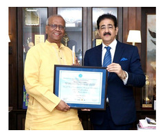 Dr. Sandeep Marwah Honors Swami Muktanand Ji Maharaj with Life Member