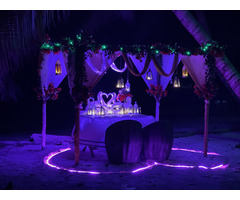 Romantic Beachside Candlelight Dinner With Decorated Canopy.