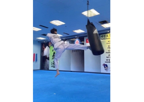 Students learn to strike moving targets with the back thrust kick
