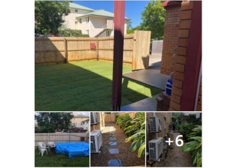 Timber fence, concrete entrance, stepping stones and front grass