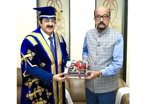 Dr. Sandeep Marwah Presents His Biographies to H.E. Ramen Deka