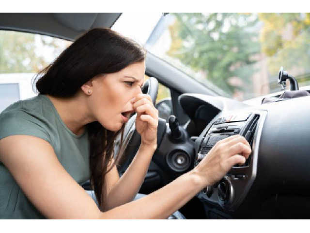 Why Does My Car Smell Like Gas? Causes & Fixes