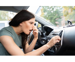 Why Does My Car Smell Like Gas? Causes & Fixes