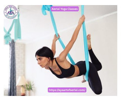 How Do Aerial Yoga Classes Enhance Strength and Flexibility?