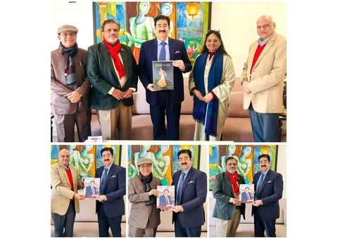 Dr. Sandeep Marwah Presents His Book to Eminent Writers