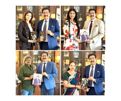 Sandeep Marwah Presents His Books to Distinguished Guests