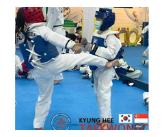 Taekwondo partners training shows students the value of team work